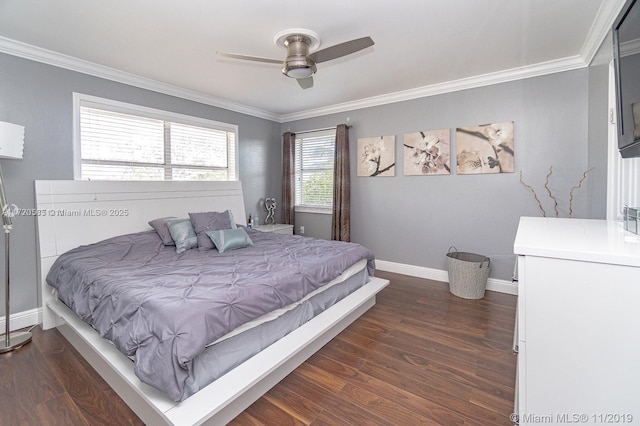 bedroom with ceiling fan, dark hardwood / wood-style flooring, and crown molding