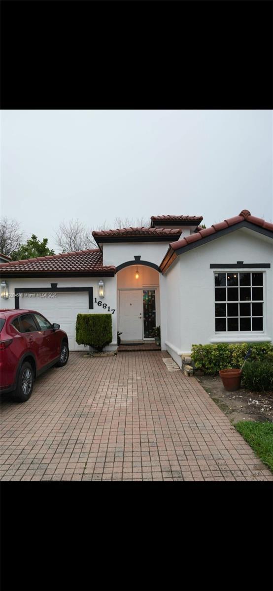 view of front of home featuring a garage