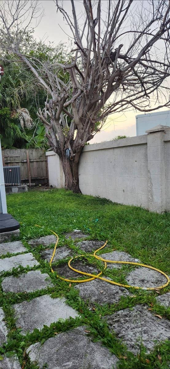 16817SW 90th St, Miami, FL 33196 - view of yard featuring fence