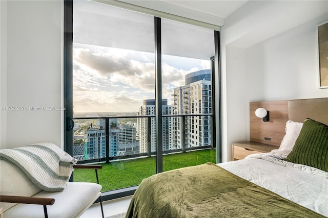 bedroom with a wall of windows