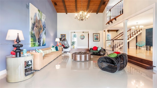 1524 39th St, West Palm Beach, FL 33407 - living area featuring a chandelier, a wooden ceiling with exposed beams, stairway, high vaulted ceiling, and ornate columns