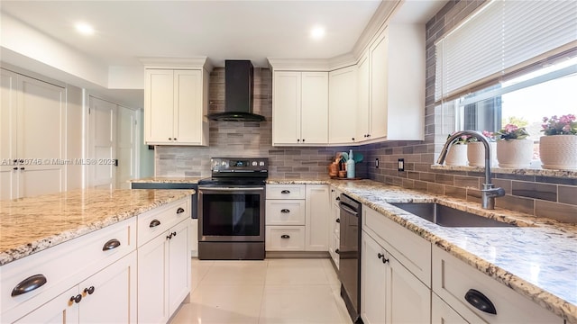 1524 39th St, West Palm Beach, FL 33407 - kitchen featuring wall chimney range hood, stainless steel electric range oven, a sink, backsplash, and light tile patterned floors