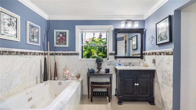 1524 39th St, West Palm Beach, FL 33407 - full bathroom featuring tile walls, vanity, a jetted tub, ornamental molding, and a wainscoted wall
