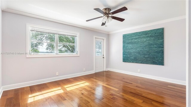 1524 39th St, West Palm Beach, FL 33407 - unfurnished room with crown molding, wood finished floors, and ceiling fan
