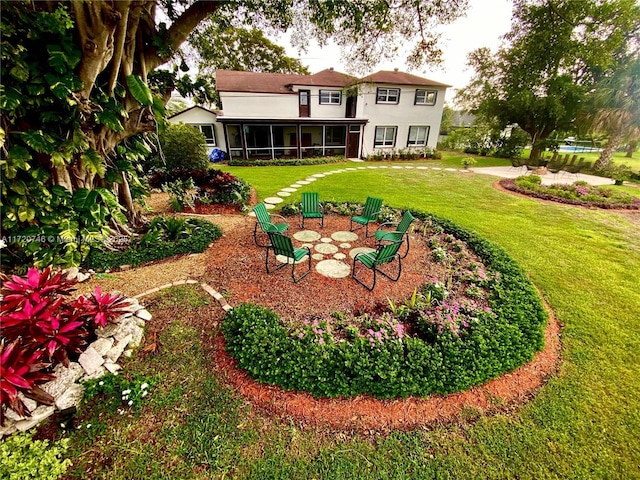 1524 39th St, West Palm Beach, FL 33407 - view of grassy yard featuring a sunroom