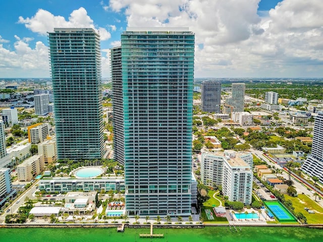 bird's eye view featuring a water view and a view of city