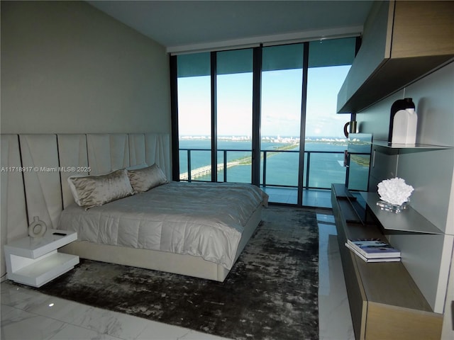 bedroom featuring a water view, marble finish floor, floor to ceiling windows, and access to outside