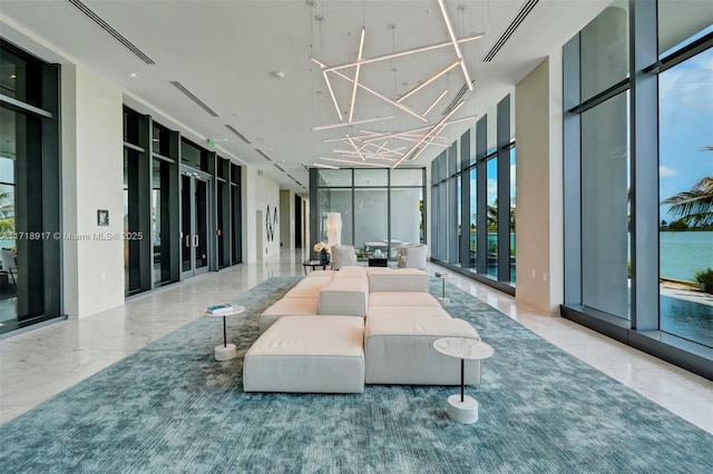 building lobby featuring a water view