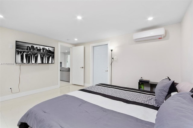 bedroom featuring a wall unit AC and a closet