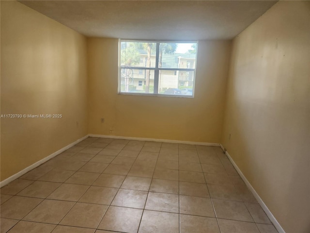 view of tiled spare room