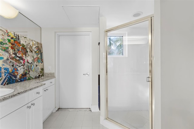 bathroom with vanity and an enclosed shower