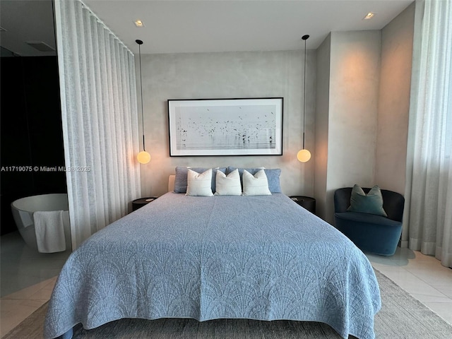 bedroom with tile patterned floors