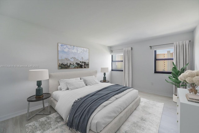 bedroom with light hardwood / wood-style flooring