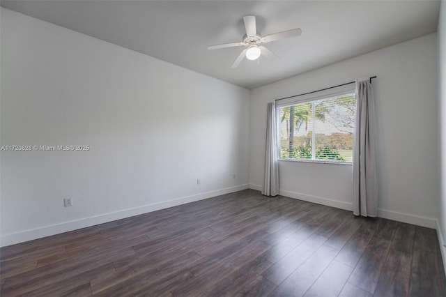 unfurnished room featuring dark hardwood / wood-style floors and ceiling fan