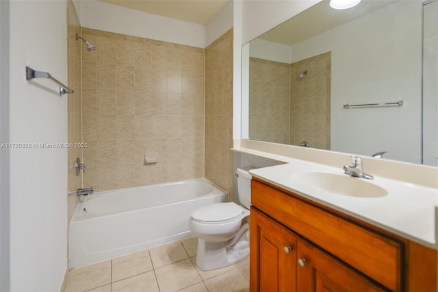 full bathroom featuring tile patterned flooring, vanity, toilet, and tiled shower / bath combo