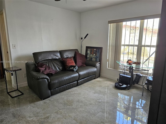 living room featuring ceiling fan