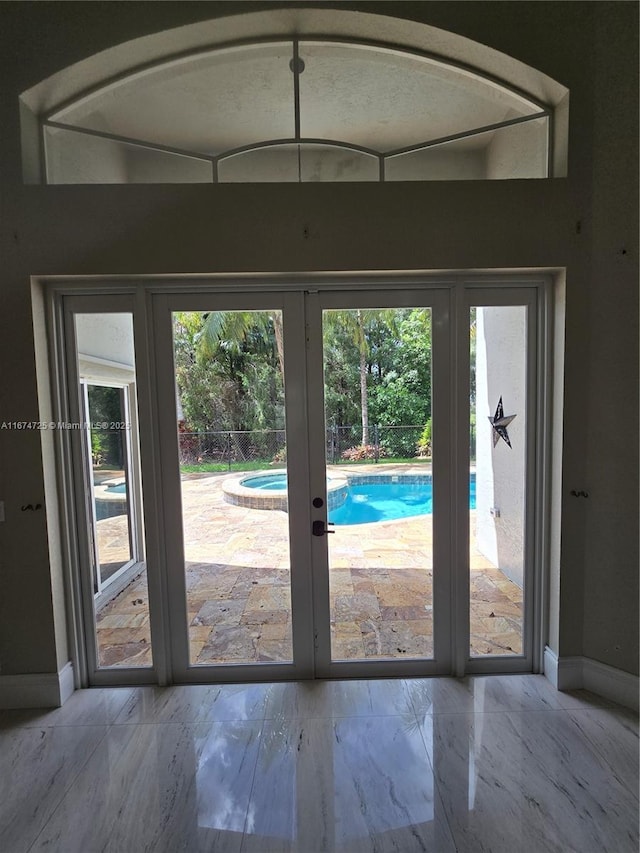 entryway featuring french doors