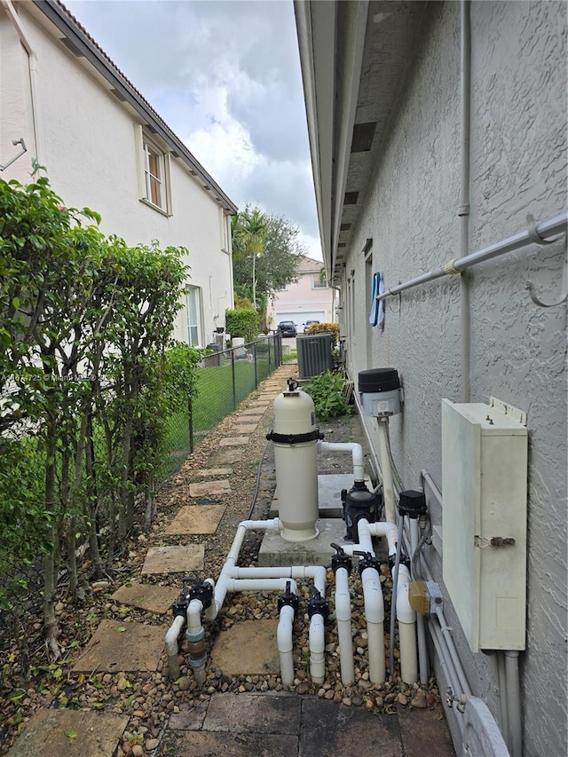 view of yard featuring central air condition unit