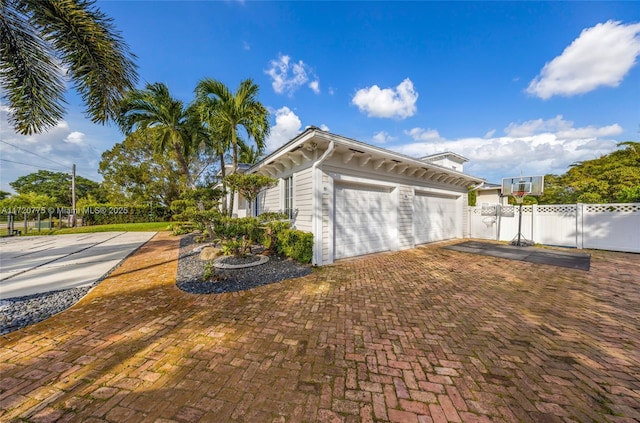 view of home's exterior with a garage