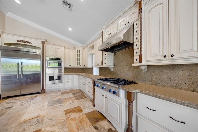 kitchen with appliances with stainless steel finishes, backsplash, extractor fan, crown molding, and lofted ceiling