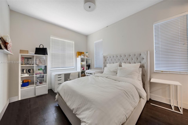 bedroom featuring dark wood-type flooring