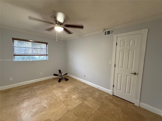 empty room featuring a textured ceiling, ceiling fan, and ornamental molding