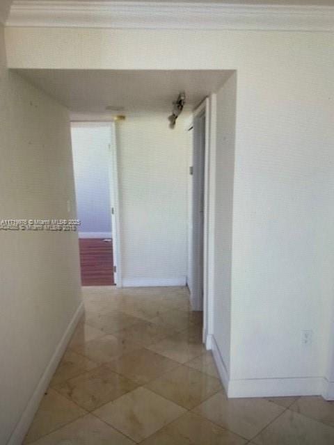 hallway with ornamental molding