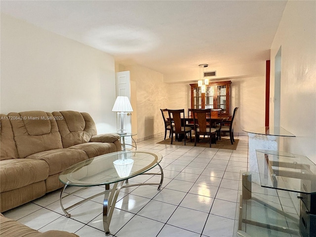 living room with light tile patterned floors