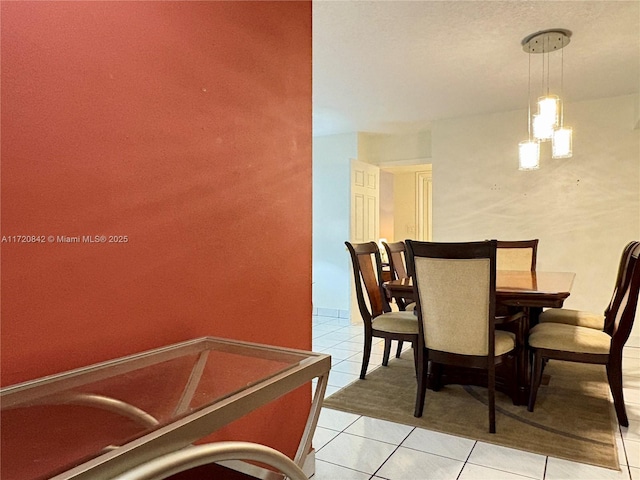 dining room featuring light tile patterned floors