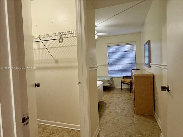 bathroom featuring ceiling fan