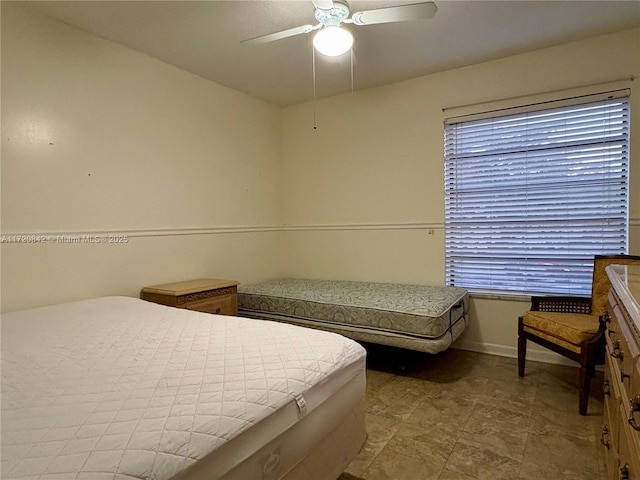 bedroom featuring ceiling fan