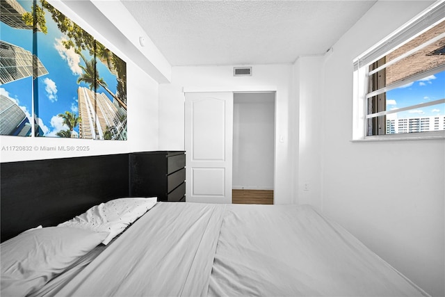 bedroom with a textured ceiling