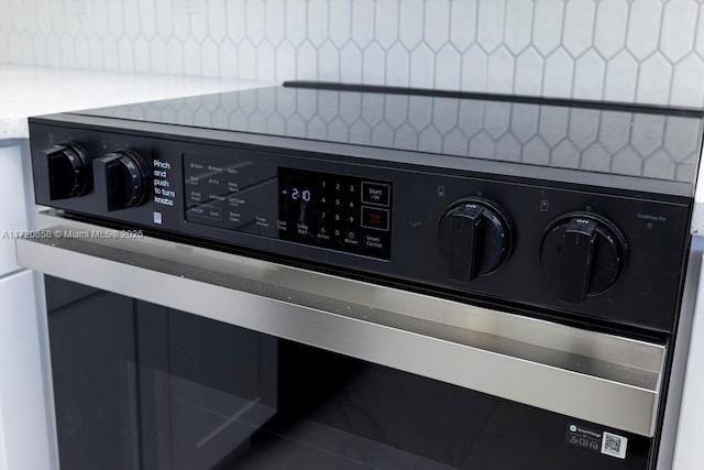 interior details with stainless steel electric range