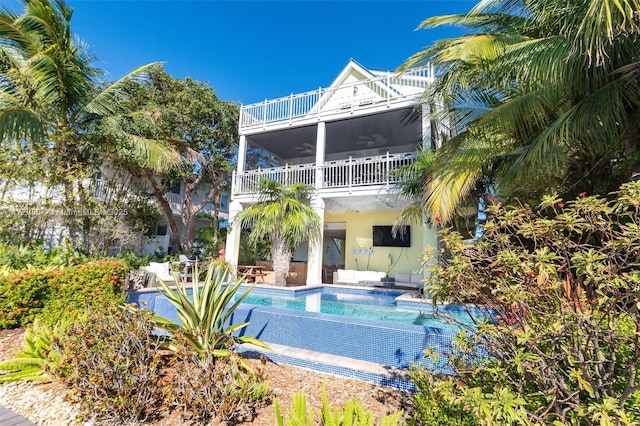 view of swimming pool with a patio area