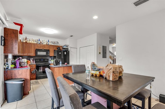 view of tiled dining space