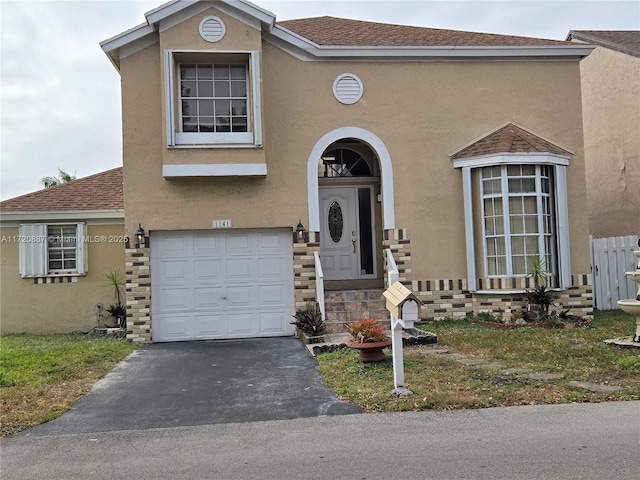 view of front of house with a garage