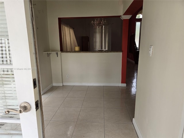 hallway with light tile patterned floors