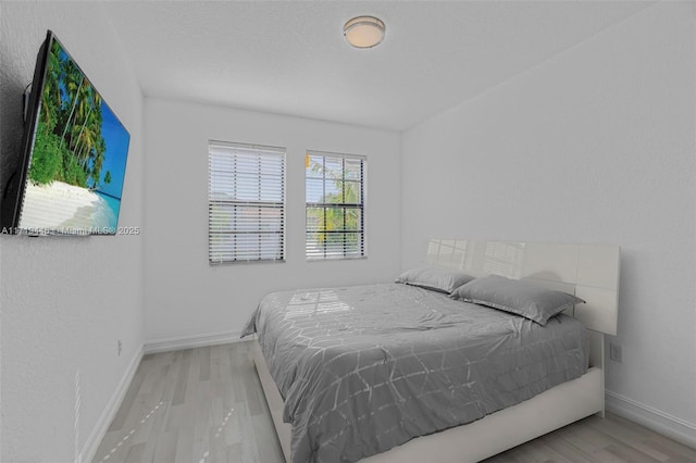 bedroom featuring light hardwood / wood-style floors