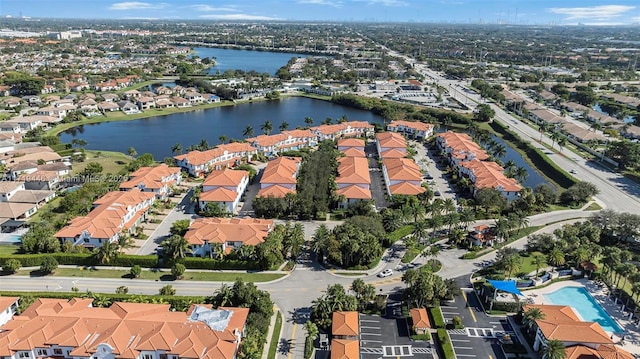 drone / aerial view with a water view