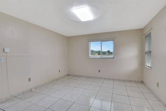 view of tiled spare room