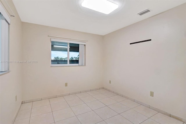 view of tiled spare room