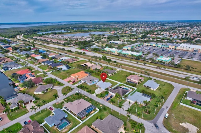 drone / aerial view with a water view