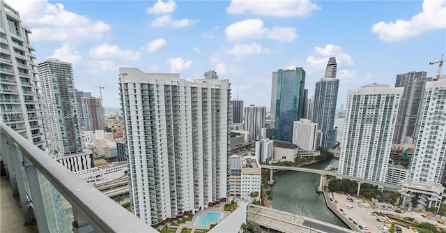 property's view of city featuring a water view