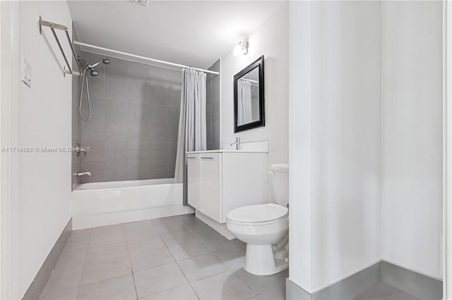 full bathroom featuring tile patterned flooring, vanity, shower / bath combination with curtain, and toilet