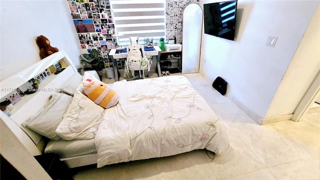 bedroom with tile patterned flooring