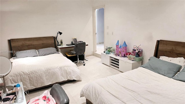 bedroom featuring light tile patterned flooring