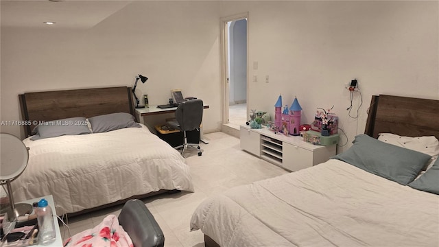 bedroom featuring light tile patterned floors