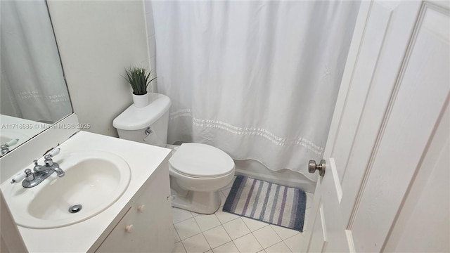 full bath with shower / bath combination with curtain, vanity, toilet, and tile patterned floors