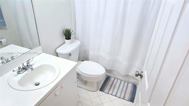 full bath featuring tile patterned flooring, vanity, toilet, and shower / bath combo with shower curtain