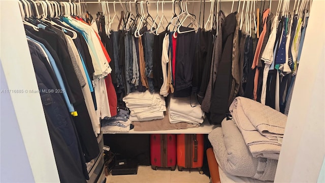 walk in closet featuring light tile patterned floors